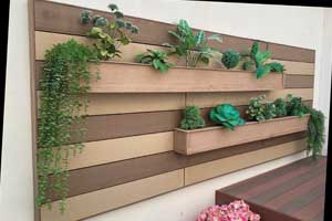 Paneles con Jardineras de madera tecnológica